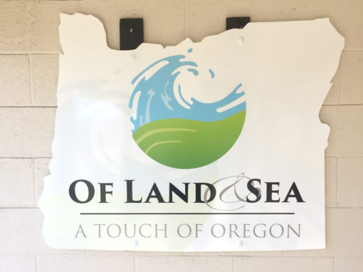 Of Land & Sea – Sign